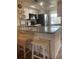 Modern kitchen with stainless steel appliances and granite countertops at 2465 Northside Dr # 1203, Clearwater, FL 33761