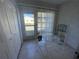 Sunroom with a small table and chairs, providing access to the backyard at 2465 Northside Dr # 1203, Clearwater, FL 33761