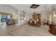Formal dining room with chandelier, built-in hutch, and seating for six at 2850 Deer Run, Tarpon Springs, FL 34688