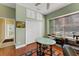 Bright office with built-in cabinets and wood floors at 2850 Deer Run, Tarpon Springs, FL 34688