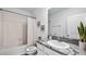 Simple bathroom with single vanity and shower/tub combo at 32603 Turtle Grace Loop, Wesley Chapel, FL 33545