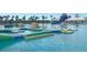 Lagoon recreation area with inflatable playground at 32603 Turtle Grace Loop, Wesley Chapel, FL 33545