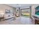 Spacious living room with sliding glass doors leading to a patio at 32603 Turtle Grace Loop, Wesley Chapel, FL 33545