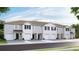 New townhouses with garages and landscaping at 32603 Turtle Grace Loop, Wesley Chapel, FL 33545