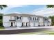Curb appeal abounds in this charming townhome community at 32607 Turtle Grace Loop, Wesley Chapel, FL 33545