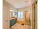 Modern bathroom with a soaking tub, shower and dual sinks at 3407 Walden Reserve Dr, Plant City, FL 33566