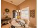 Charming dining room features a round table, black and white checkered runner, and sunflower centerpiece at 3407 Walden Reserve Dr, Plant City, FL 33566