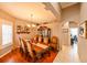 Elegant dining room with hardwood floors and a large table, perfect for Gathering gatherings at 3407 Walden Reserve Dr, Plant City, FL 33566