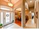 Bright and spacious entryway with views into the dining room and hallway at 3407 Walden Reserve Dr, Plant City, FL 33566