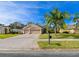 Beautiful two-story home with a three-car garage and a nicely landscaped lawn at 3407 Walden Reserve Dr, Plant City, FL 33566