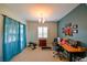 Bright home office with a desk, treadmill and window coverings at 3407 Walden Reserve Dr, Plant City, FL 33566