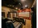 State-of-the-art home theater with premium seating and large projection screen at 3407 Walden Reserve Dr, Plant City, FL 33566