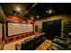 Spacious home theater with large screen and comfortable seating at 3407 Walden Reserve Dr, Plant City, FL 33566