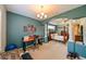 Home office with treadmill, desk and plenty of natural light at 3407 Walden Reserve Dr, Plant City, FL 33566