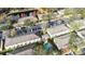 Aerial view of townhouses, pool, and lake; community setting at 3529 High Hampton Cir, Tampa, FL 33610