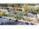 Aerial view of townhouses with parking and pond at 3529 High Hampton Cir, Tampa, FL 33610