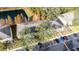 Aerial view of townhouses near a lake with ample parking at 3529 High Hampton Cir, Tampa, FL 33610