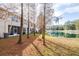 Backyard with pond view and lush landscaping at 3529 High Hampton Cir, Tampa, FL 33610