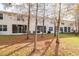 Private backyard with screened patio and mature trees at 3529 High Hampton Cir, Tampa, FL 33610