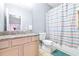 Clean bathroom with granite countertop, tub, and shower at 3529 High Hampton Cir, Tampa, FL 33610