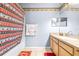 Main bathroom with shower/tub and wood vanity at 3529 High Hampton Cir, Tampa, FL 33610