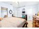 Large bedroom with king bed and built-in shelving at 3529 High Hampton Cir, Tampa, FL 33610