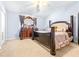 Spacious bedroom with a king-size bed and dresser at 3529 High Hampton Cir, Tampa, FL 33610