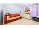 Charming bedroom with a double bed, dresser, and tasteful decor at 3529 High Hampton Cir, Tampa, FL 33610