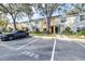 Townhome community with parking and landscaping at 3529 High Hampton Cir, Tampa, FL 33610