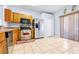 Kitchen with stainless steel appliances and wood cabinets at 3529 High Hampton Cir, Tampa, FL 33610