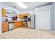 Kitchen with stainless steel appliances and wood cabinets at 3529 High Hampton Cir, Tampa, FL 33610