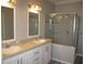 Double vanity bathroom with shower and tub at 3722 Spinnaker Dr, Tampa, FL 33611
