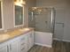 Double vanity bathroom with shower and tub at 3722 Spinnaker Dr, Tampa, FL 33611