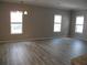Dining room with gray walls and wood-look floors at 3722 Spinnaker Dr, Tampa, FL 33611