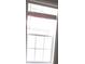 A window with mini blinds at 3722 Spinnaker Dr, Tampa, FL 33611