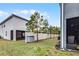 Private backyard with fence and small grassy area at 3830 Vignoble Ln, Brandon, FL 33511