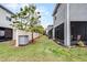 Private backyard with fence and small grassy area at 3830 Vignoble Ln, Brandon, FL 33511