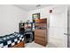 Bedroom with desk and TV at 3830 Vignoble Ln, Brandon, FL 33511