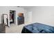 Well-lit bedroom with a walk-in closet and dresser at 3830 Vignoble Ln, Brandon, FL 33511