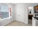 Bedroom with window, closet, and bathroom access at 3830 Vignoble Ln, Brandon, FL 33511