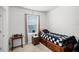 Small bedroom with wood bed frame at 3830 Vignoble Ln, Brandon, FL 33511