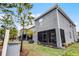 Exterior view of the home with a screened-in porch at 3830 Vignoble Ln, Brandon, FL 33511