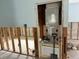 Utility room with visible HVAC unit, exposed wall studs, awaiting renovation at 442 Country Club Dr, Oldsmar, FL 34677
