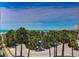 Parking lot and beach access at 4510 Gulf Blvd # 408, St Pete Beach, FL 33706