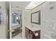 Bathroom with vanity, toilet, and shower at 4510 Gulf Blvd # 408, St Pete Beach, FL 33706