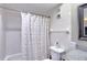 Clean bathroom with shower, vanity, and toilet at 4510 Gulf Blvd # 408, St Pete Beach, FL 33706