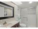 Clean bathroom with shower, vanity, and toilet at 4510 Gulf Blvd # 408, St Pete Beach, FL 33706