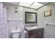 Bathroom with tub shower, vanity, and toilet at 4510 Gulf Blvd # 408, St Pete Beach, FL 33706