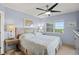 Main bedroom with ocean view and king-size bed at 4510 Gulf Blvd # 408, St Pete Beach, FL 33706