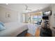 Main bedroom with water views and private balcony access at 477 20Th Ave, Indian Rocks Beach, FL 33785